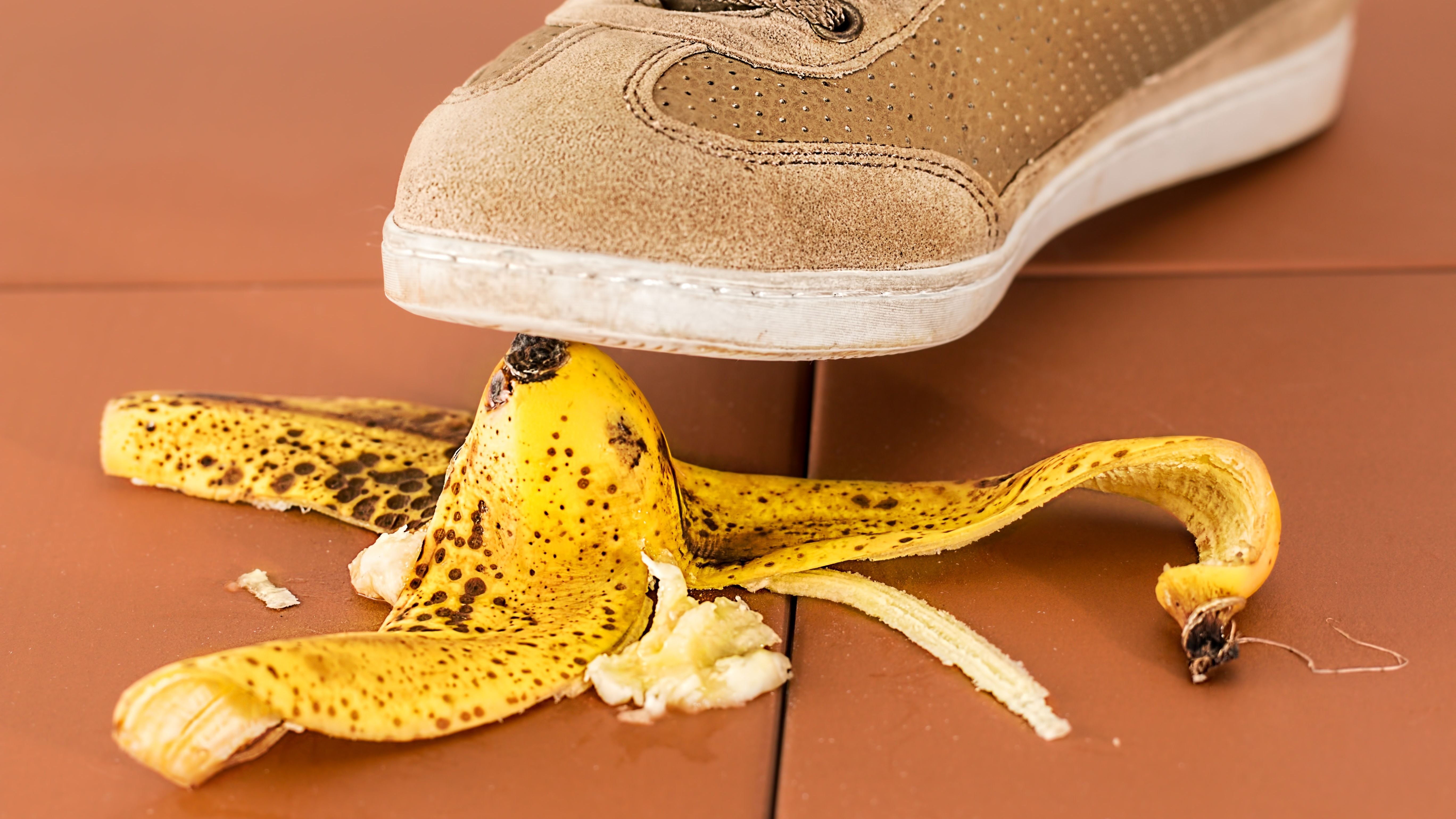 Person about to stand on banana skin