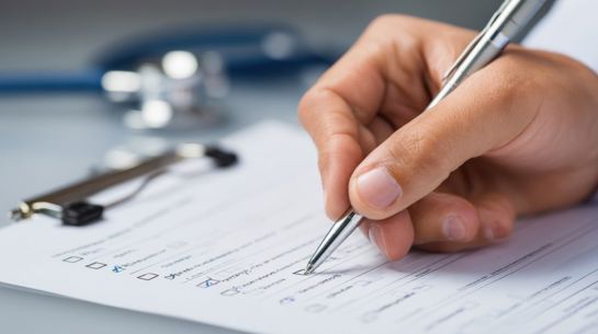 Person Filling Out Form